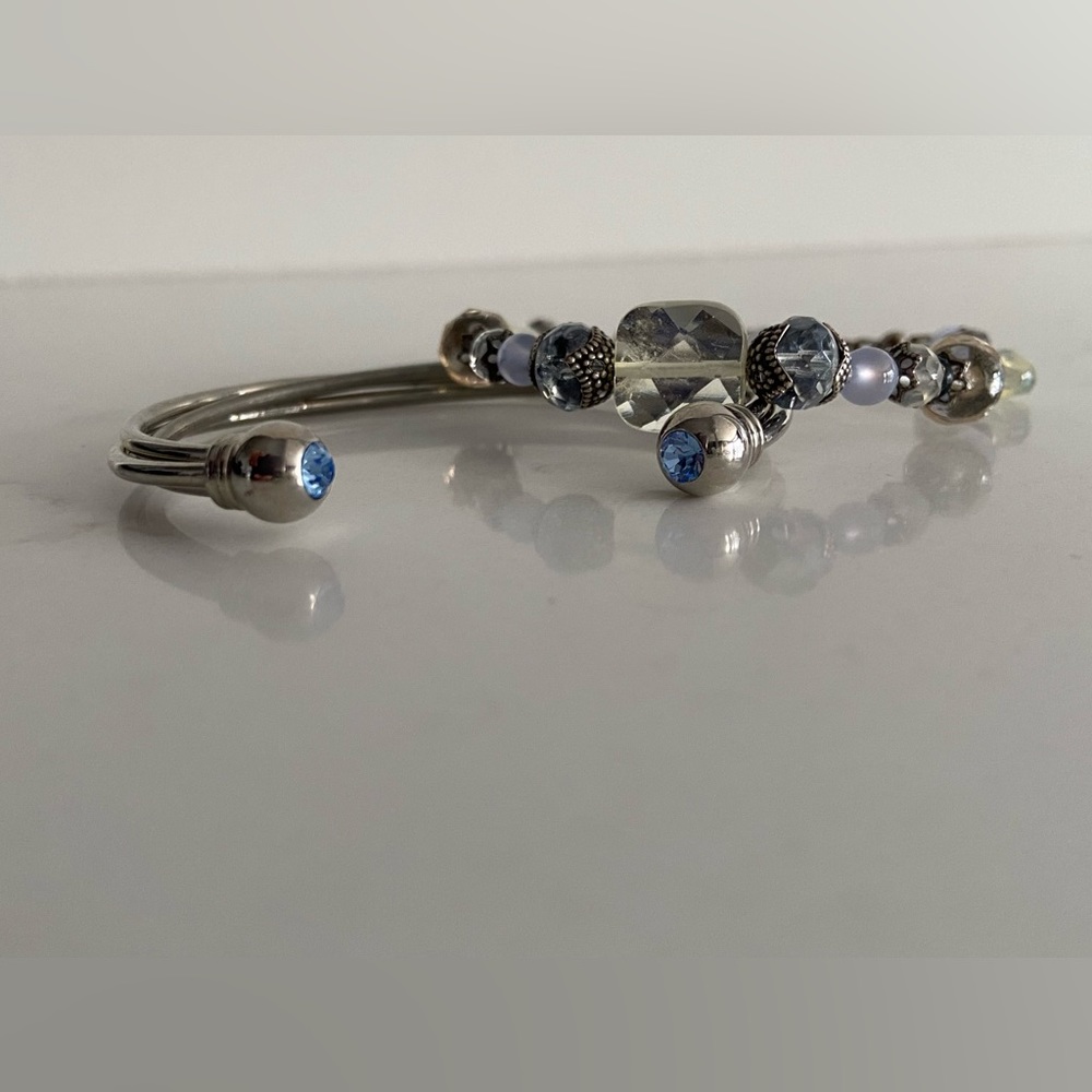 Blue and Silvertone Costume Bracelts. The beaded bracelet is by Desert Heart.